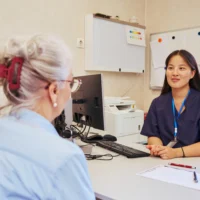 doctor talking to patient